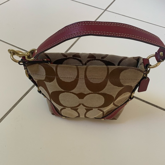 Coach Handbags - COACH MINI HANDBAG.USED COUPLE TIMES.